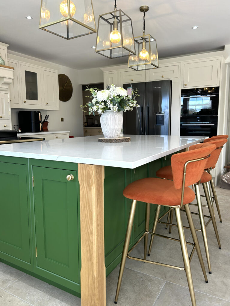 Hopper Green kitchen island in kitchen renovation Guernsey with added lighting.