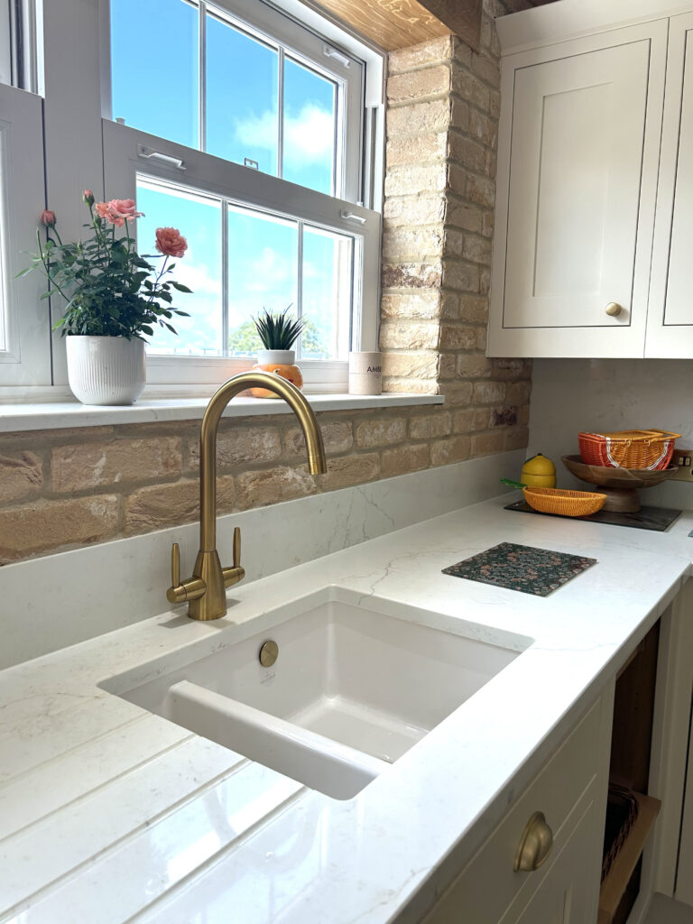 Kitchen renovation Guernsey with new worktops and added brick slips